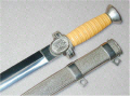 Social Welfare Officer's Dagger (notice the round holes in the scabbard rings).